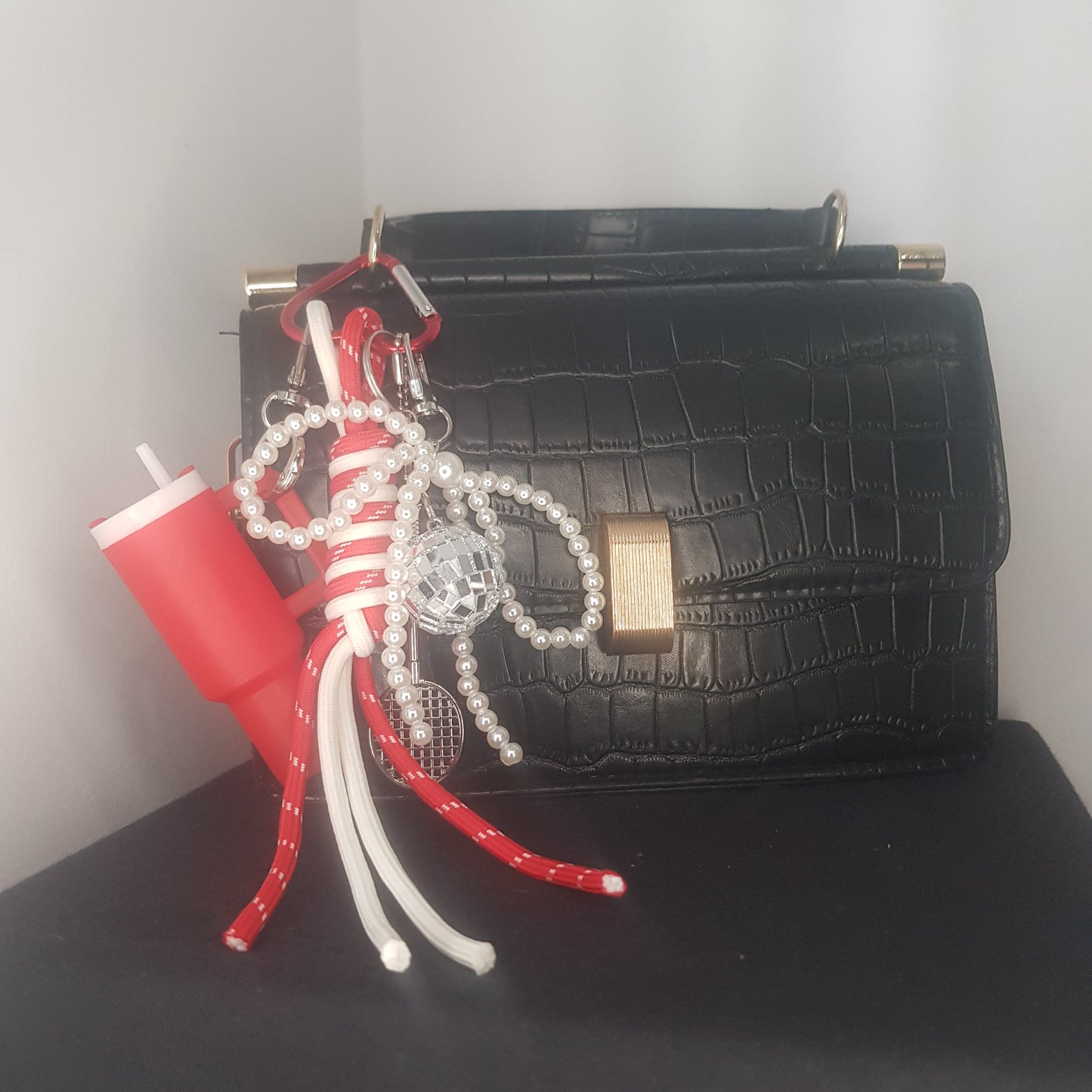 Pingente de bolsa FACETA